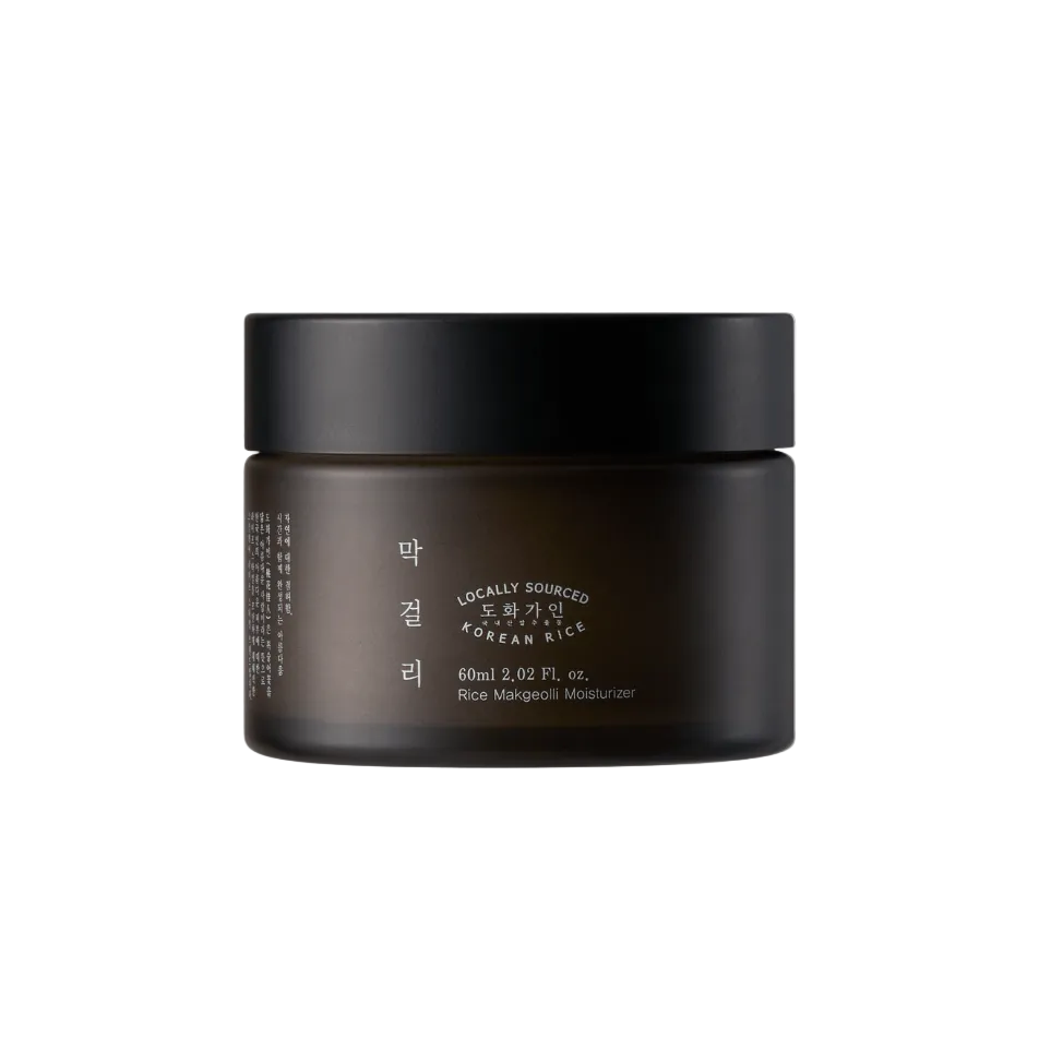 A dark brown jar of locally sourced Rice Mangoeli Moisturizer by GAEHAN X CRAFT, shown on a light gray background.