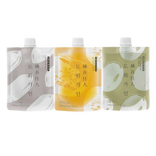 Three 160ml pouches of Dohwa Garden organic fruit juice arranged side by side on a light gray background. The left pouch is light gray with white abstract graphics, the middle pouch is golden yellow with orange abstract graphics, and the right pouch is sage green with white abstract graphics.